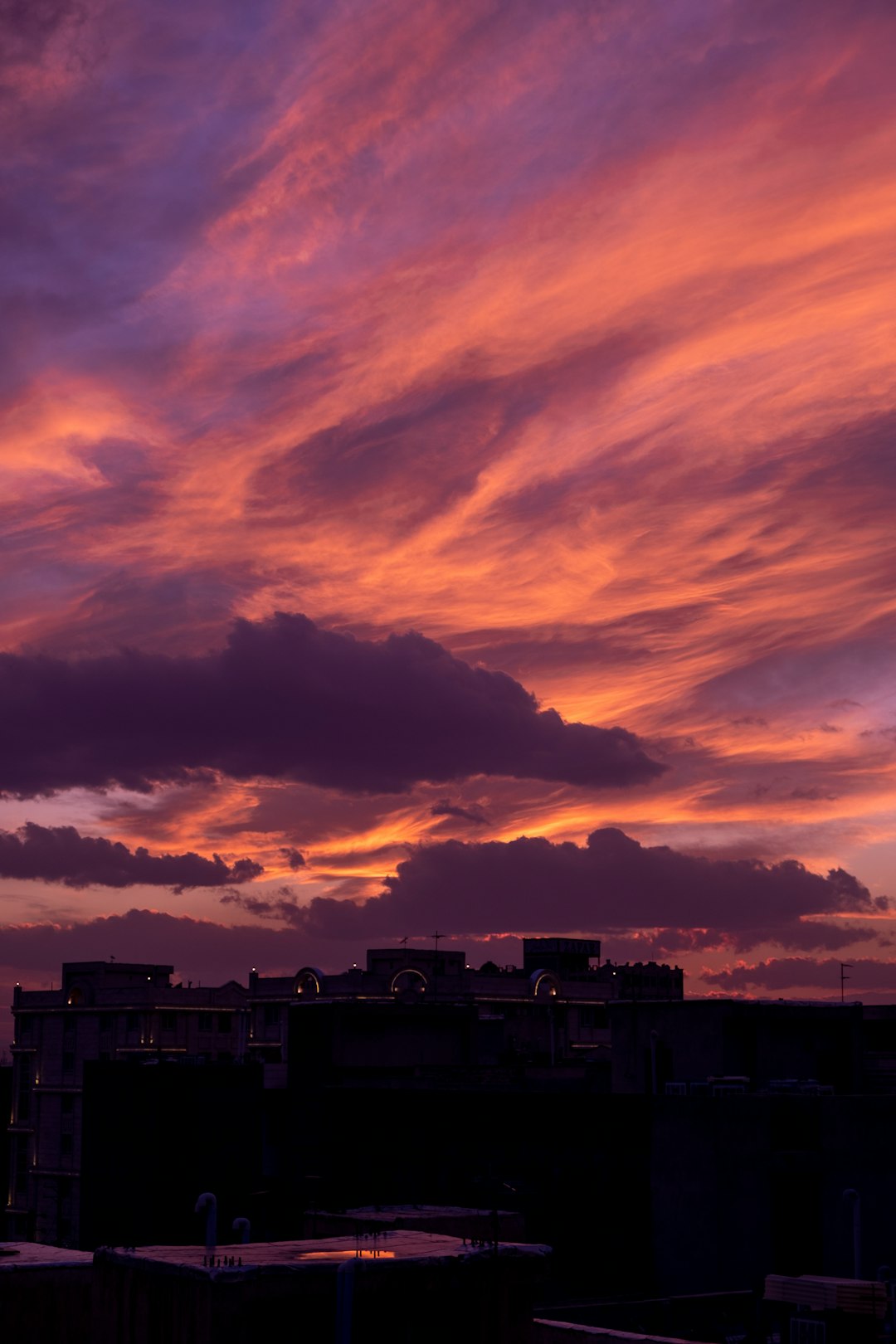 silhouette of buildings during sunset