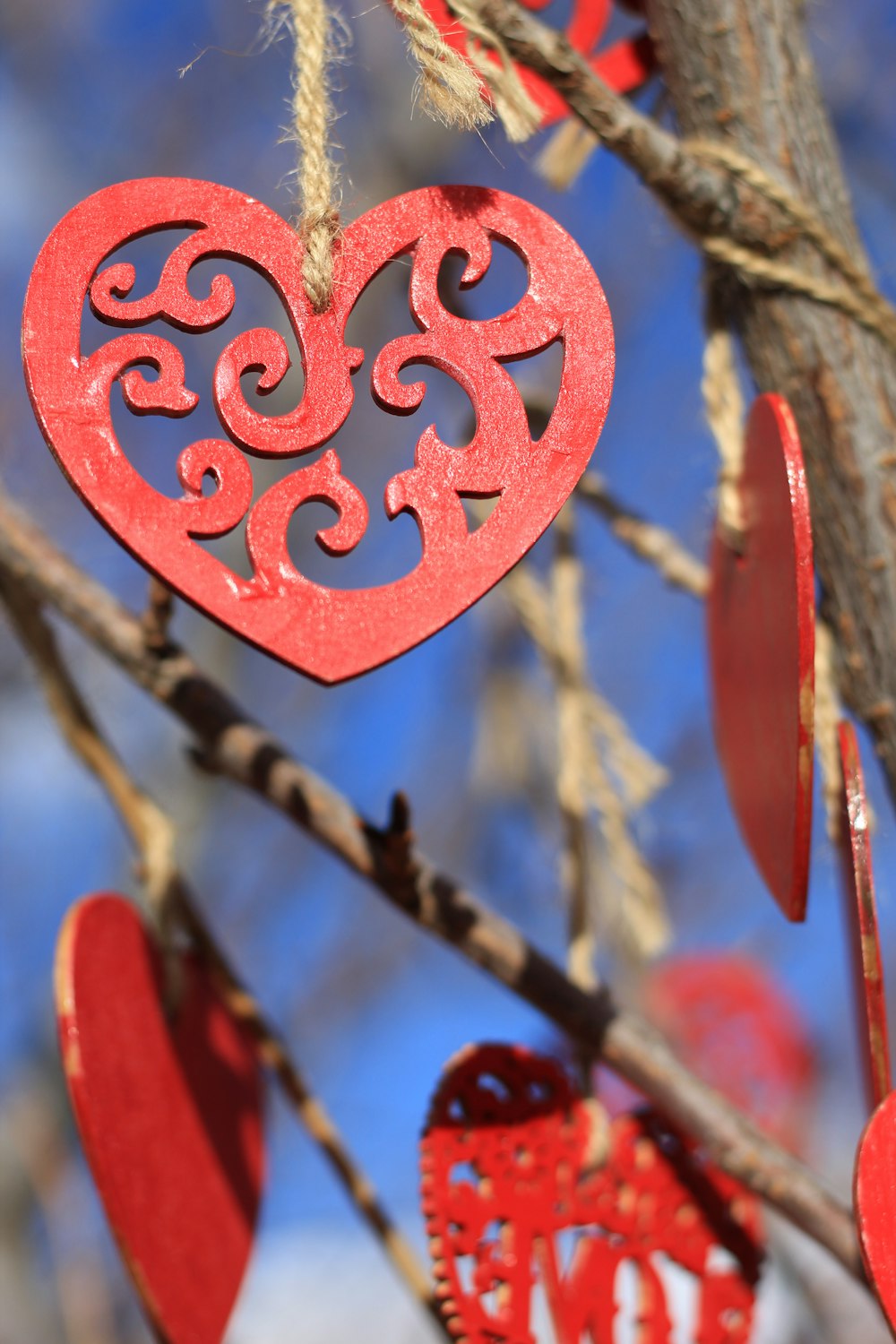 red and white heart shaped hanging decor