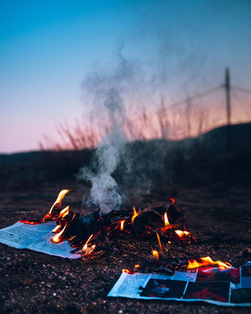 fire on black fire pit during daytime