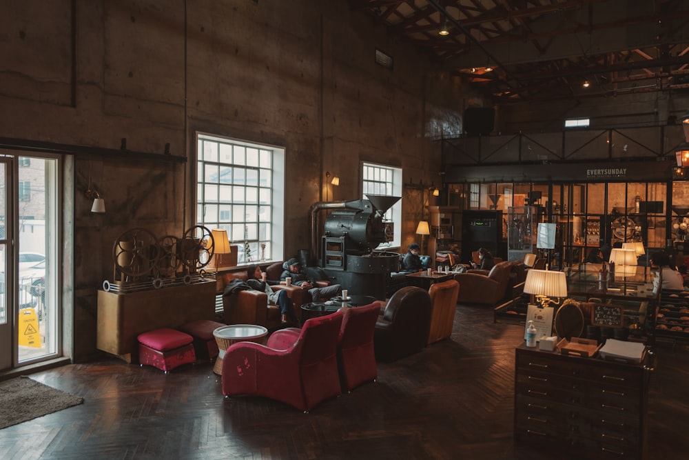 red sofa chair near brown wooden table