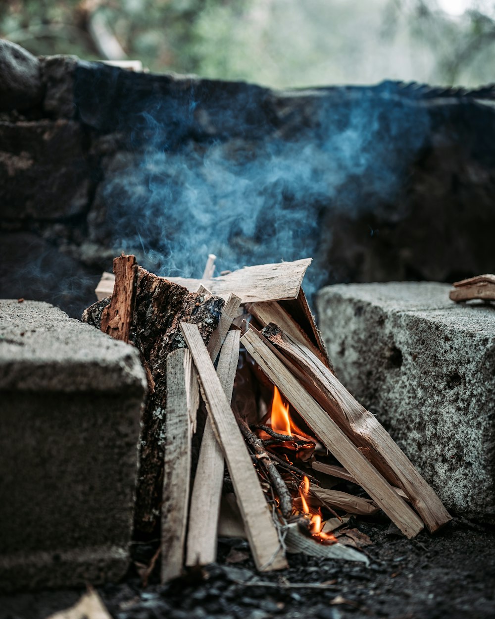 fire on fire pit during daytime