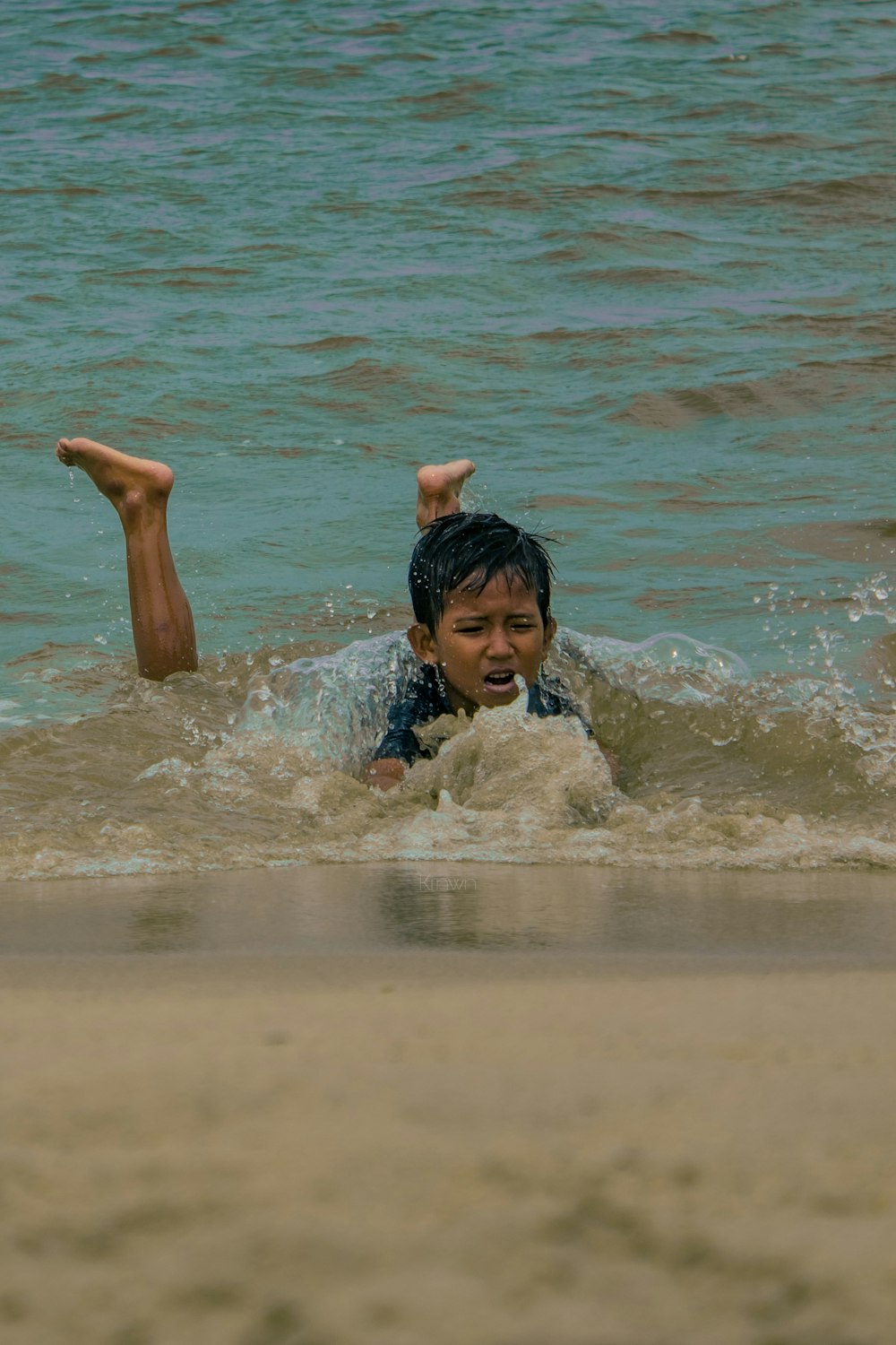 girl in water during daytime