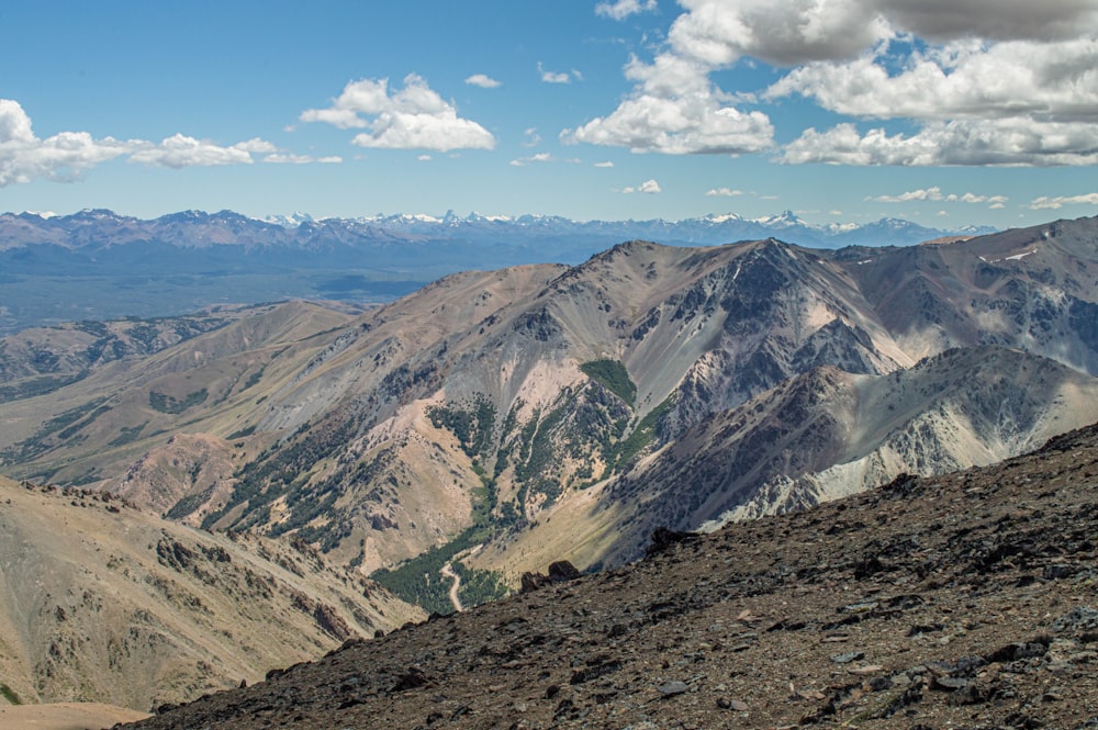 green and brown mountains under blue sky during daytime