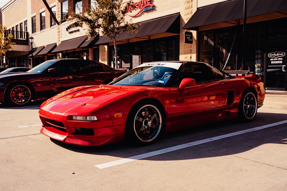 red ferrari 458 italia parked on street during daytime