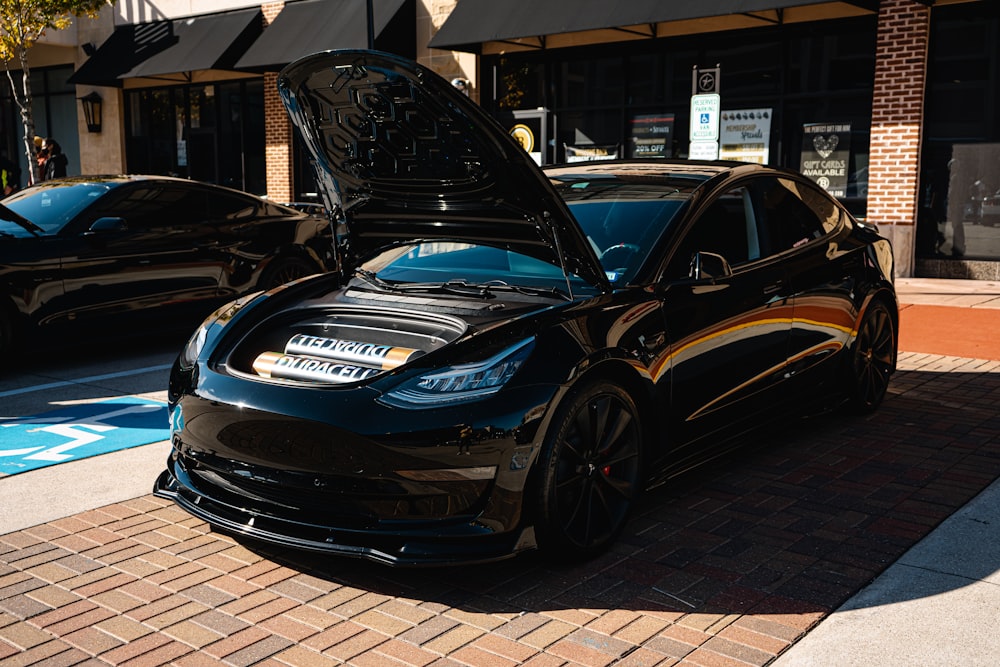 black porsche 911 parked on street