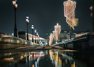 Evening view of well-lit pathways and eco-friendly street lamps in the residential colony.