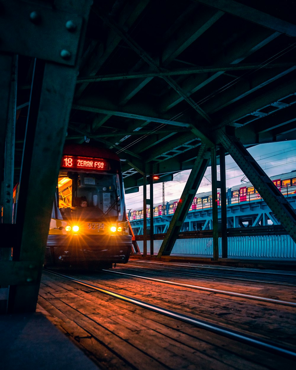 red and black train in train station