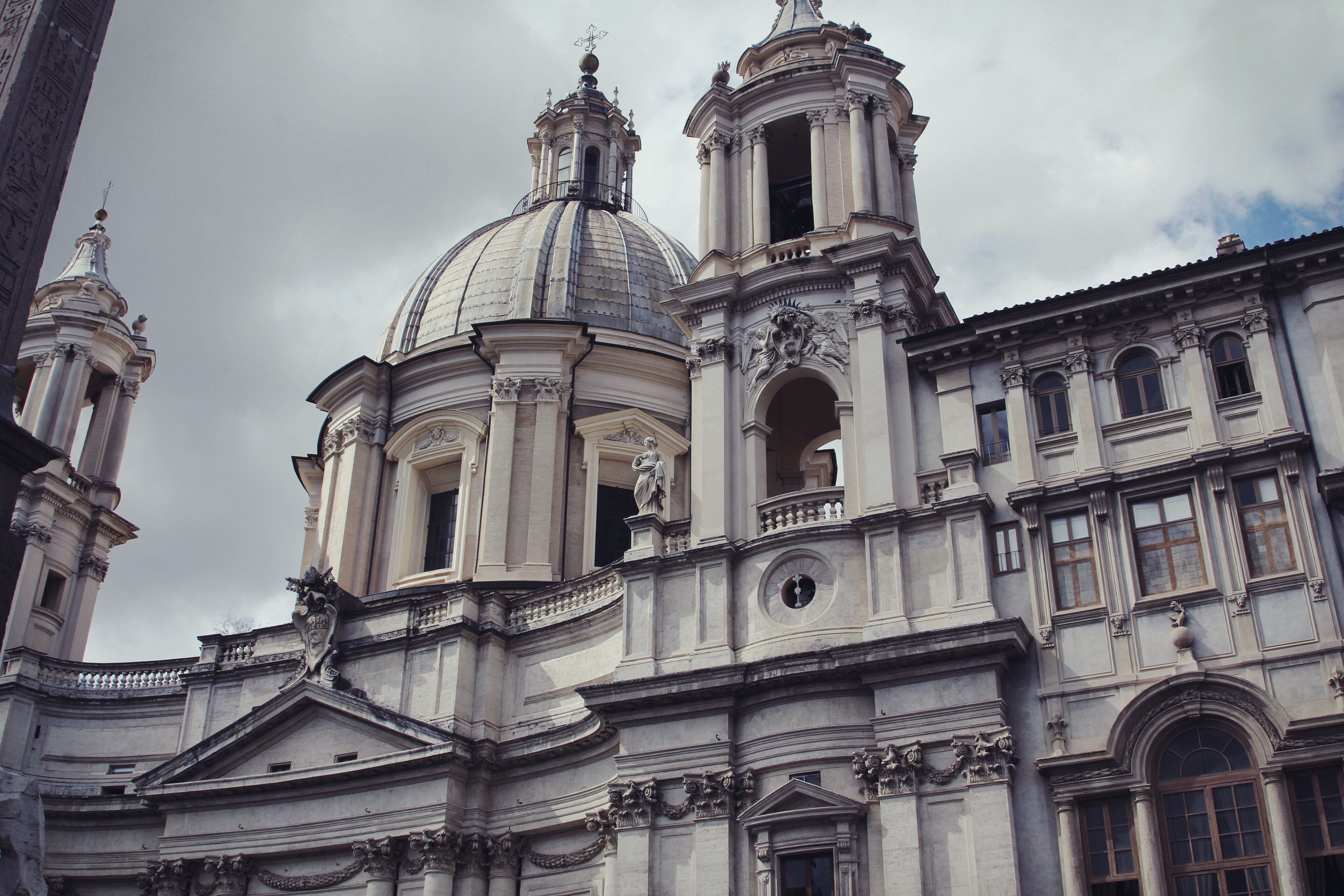 white and brown concrete building under white clouds during daytime, Beauty of architecture 