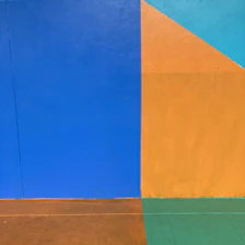 abstract geometric composition with bold red and blue blocks intersecting with thin white lines