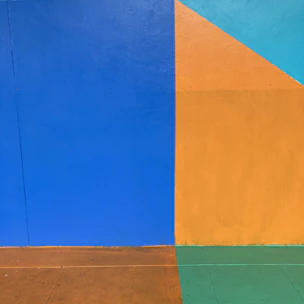 abstract geometric composition with bold red and blue blocks intersecting with thin white lines