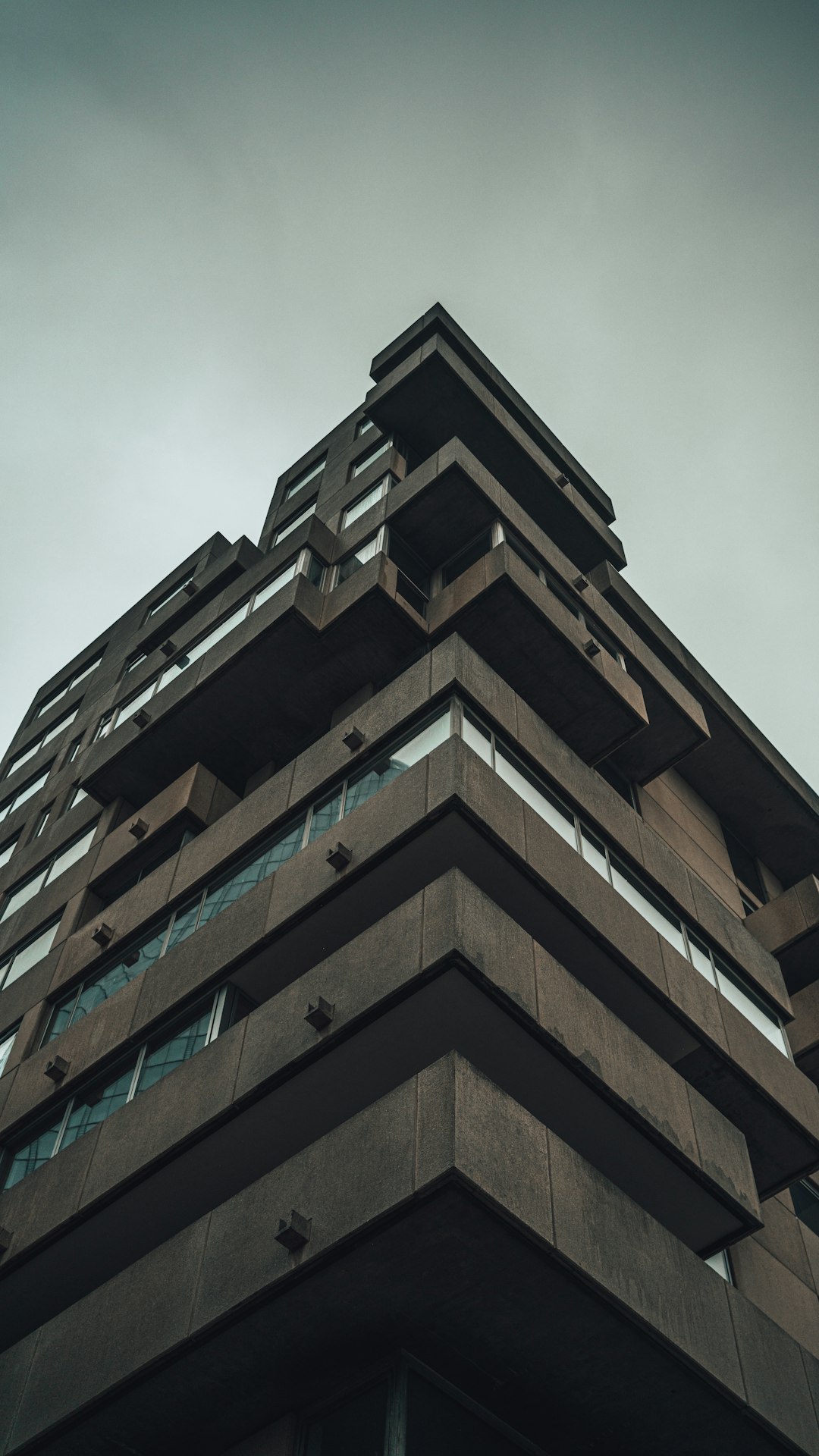 brown concrete building under blue sky during daytime