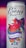 A vibrant energy drink can featuring a stylized red rooster wearing a top hat. The can is decorated with colorful graphics, including lightning bolts and a banner reading 'Blueberry Flavour.' The background is a gradient of pink and purple hues.