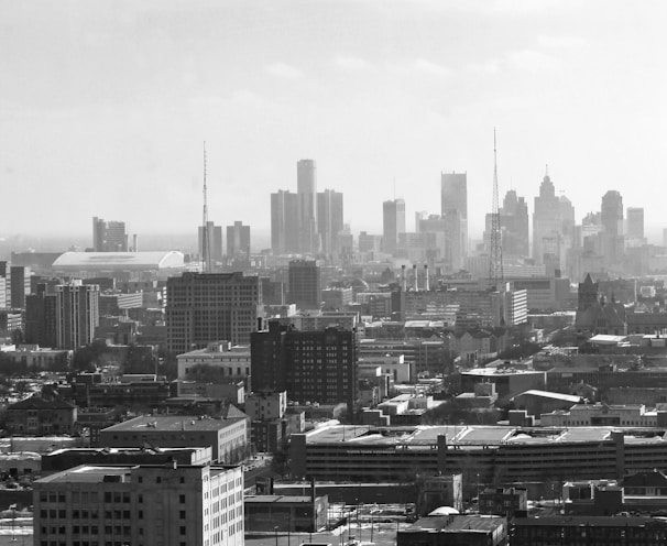 grayscale photo of city buildings