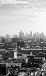 grayscale photo of city buildings