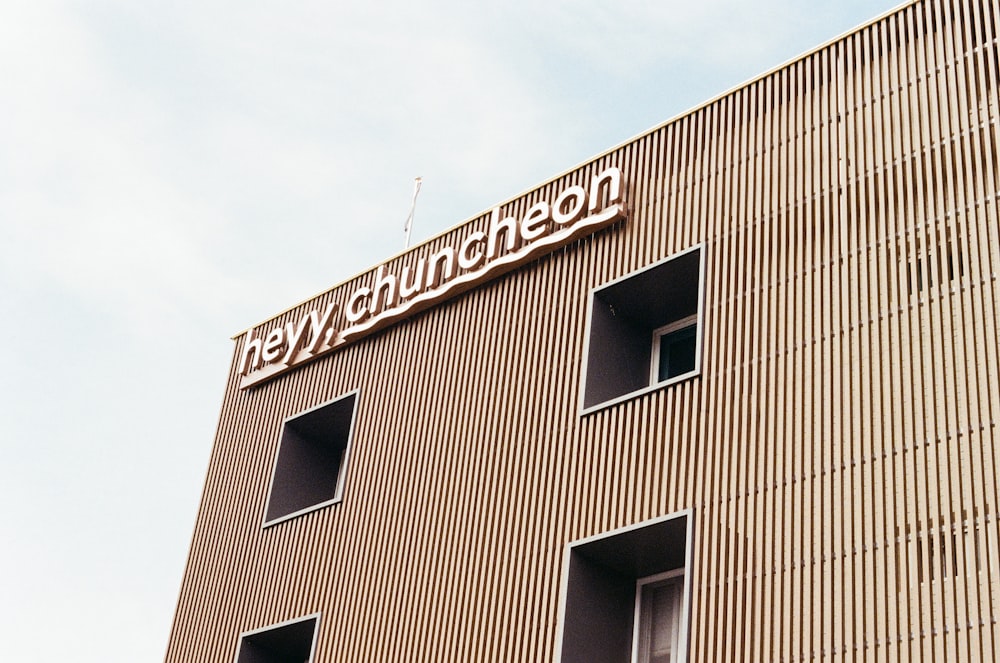 low angle photography of brown concrete building