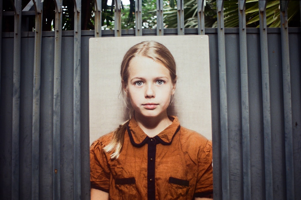 woman in orange and black button up shirt