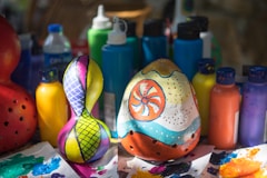blue yellow and red owl figurine