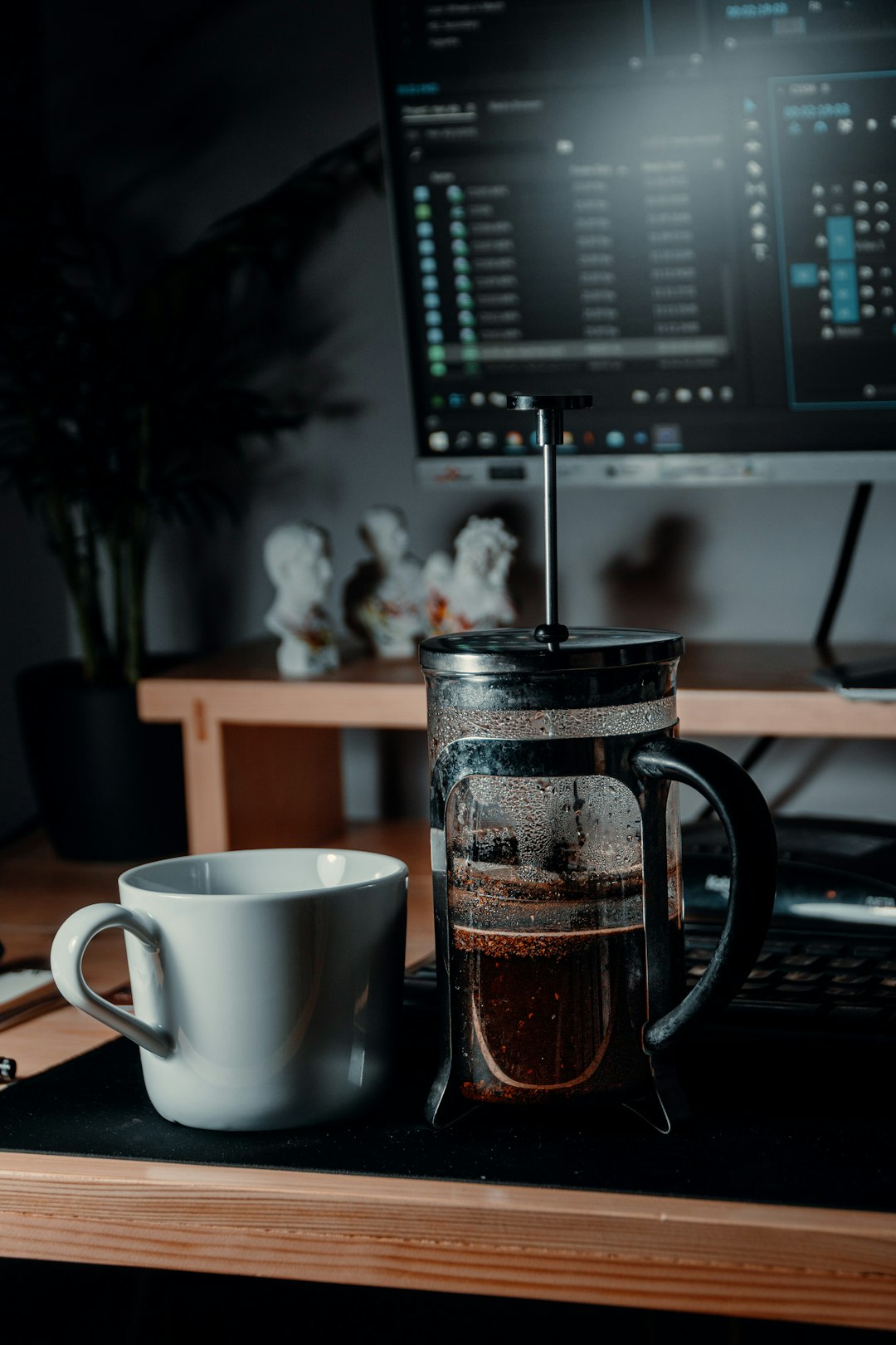 white ceramic mug on brown wooden table