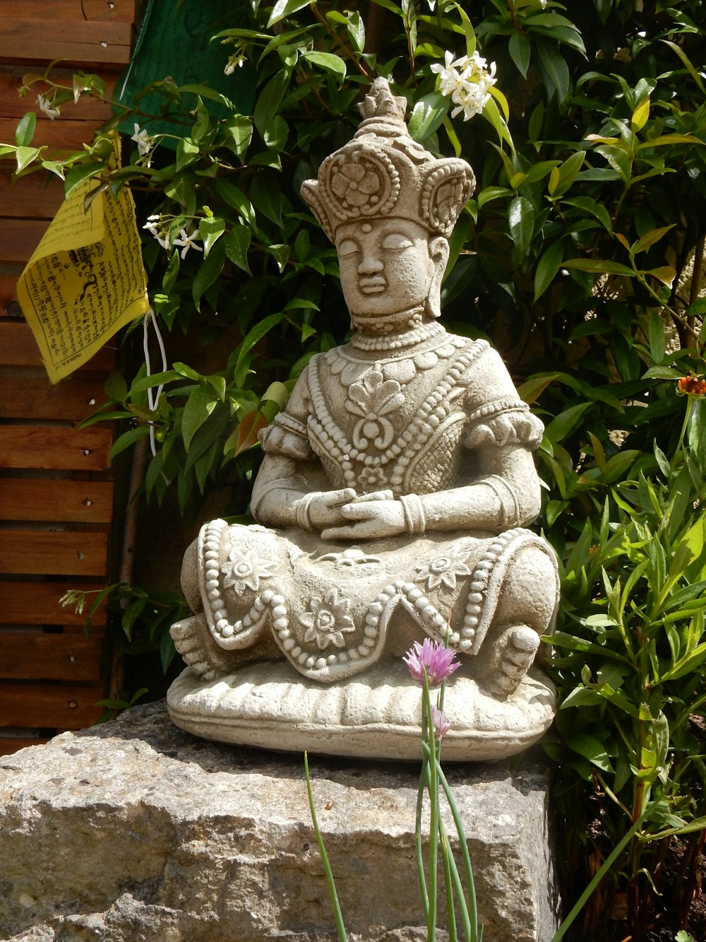 gray concrete buddha figurine on gray concrete surface
