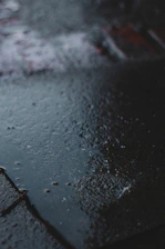water droplets on black surface