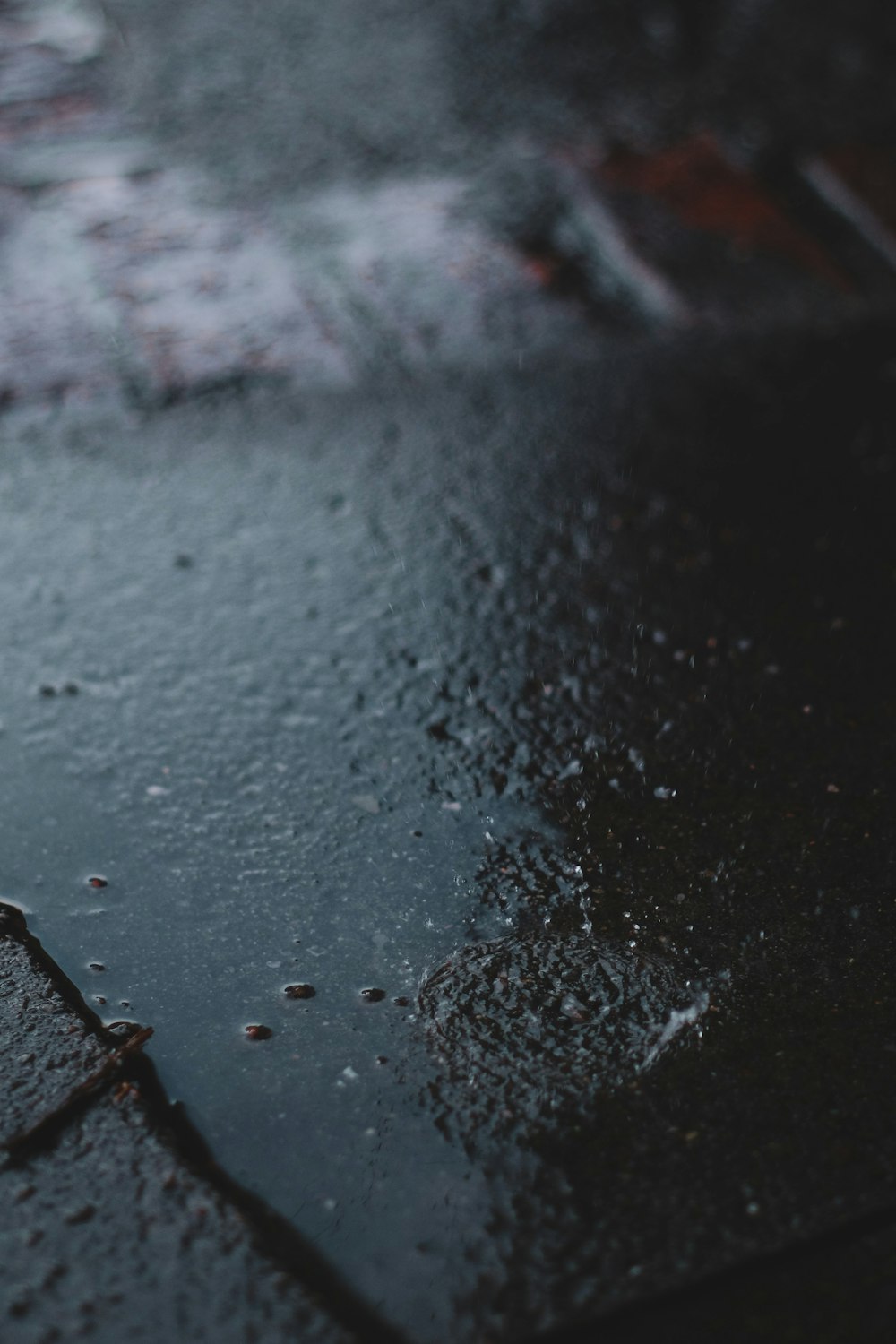 water droplets on black surface