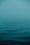 blue sea under blue sky during daytime