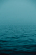 blue sea under blue sky during daytime