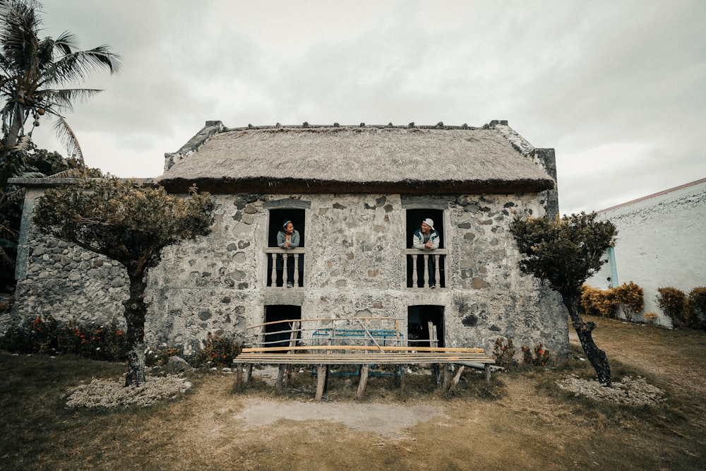 gray and white concrete house under white sky during daytime