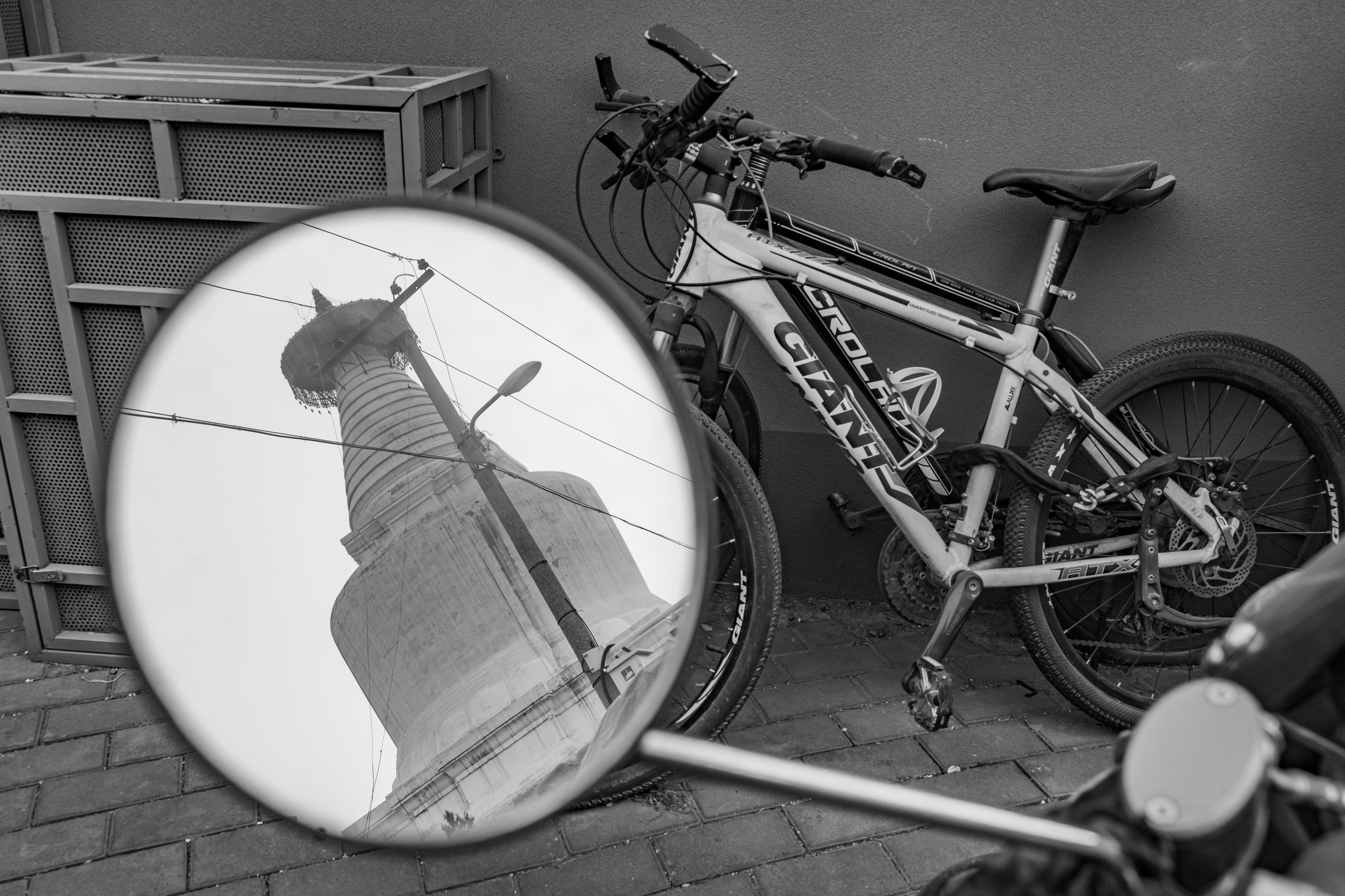 grayscale photo of mountain bike