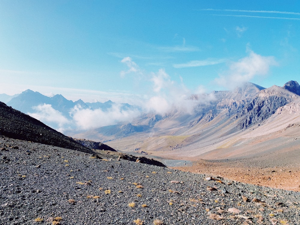 brown and white mountain under blue sky during daytime