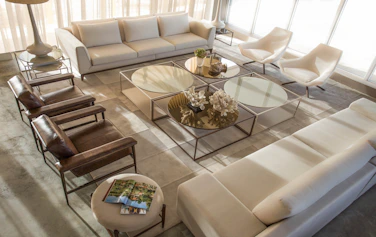 clear glass top table with brown wooden base