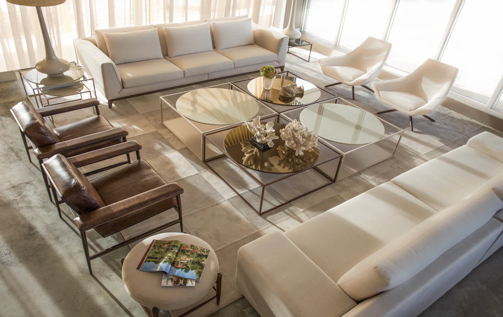 Modern furnished interior with glass-top table
