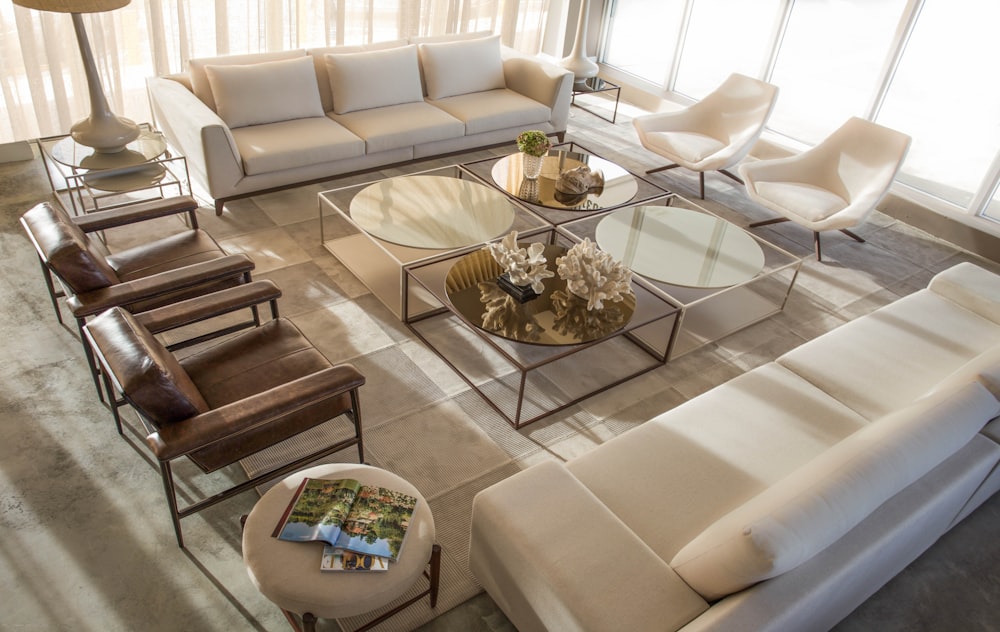 clear glass top table with brown wooden base