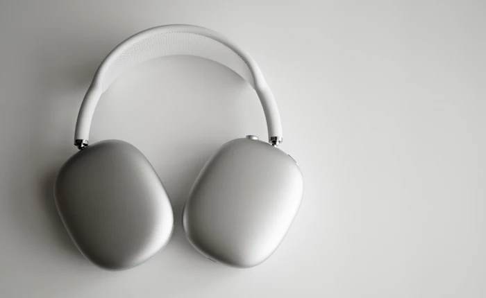Wireless headphones on a table, representing interpretation equipment for rental