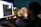 man in black shirt using computer