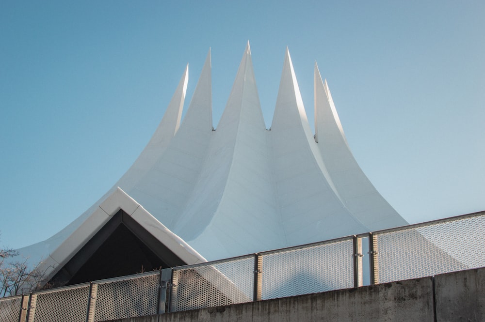 white concrete building under blue sky during daytime