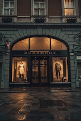 brown wooden door with black steel gate