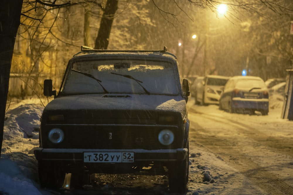 black car parked on the road during daytime