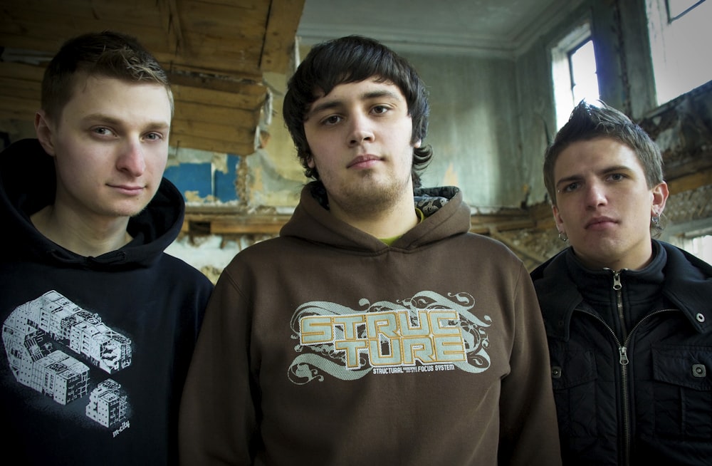 man in black hoodie standing beside man in black hoodie