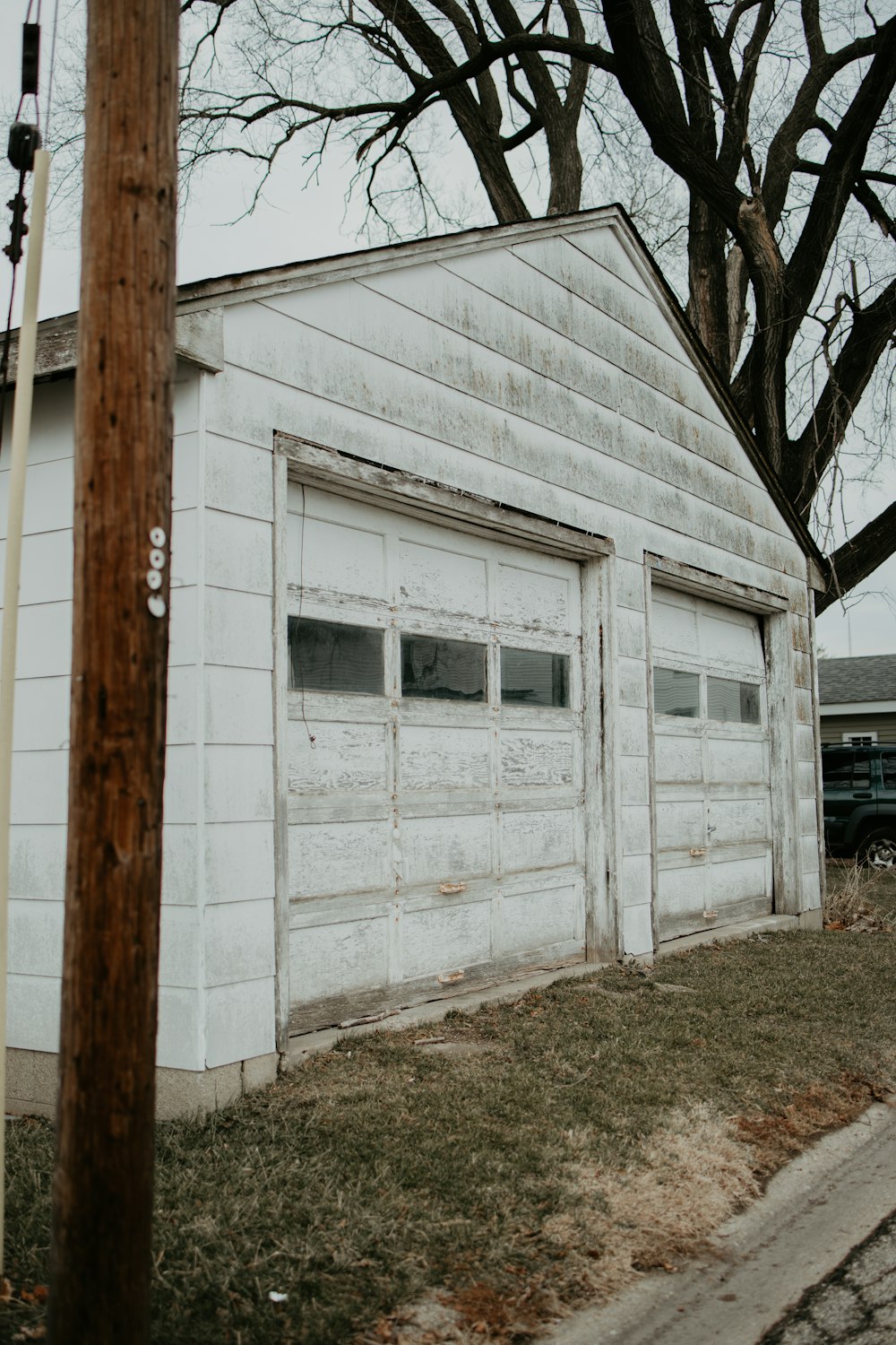 white wooden house with white wooden door