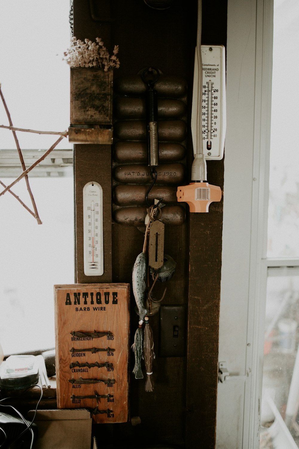 silver and brown keys on brown wooden door