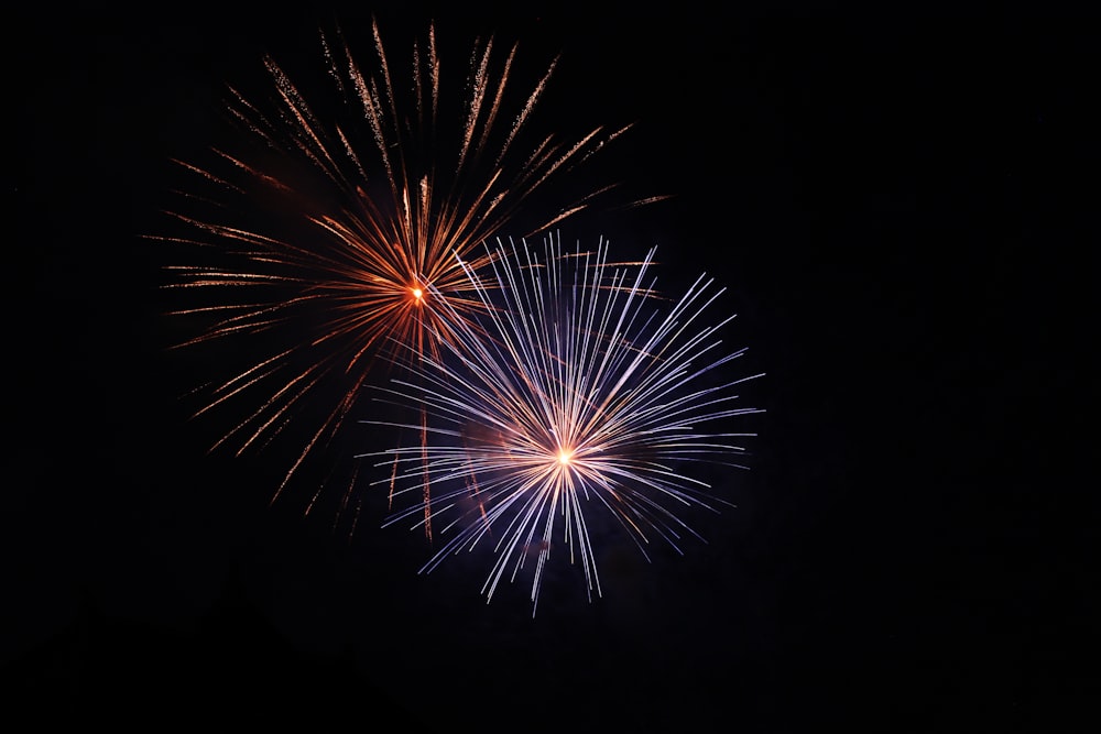 white and yellow fireworks during nighttime