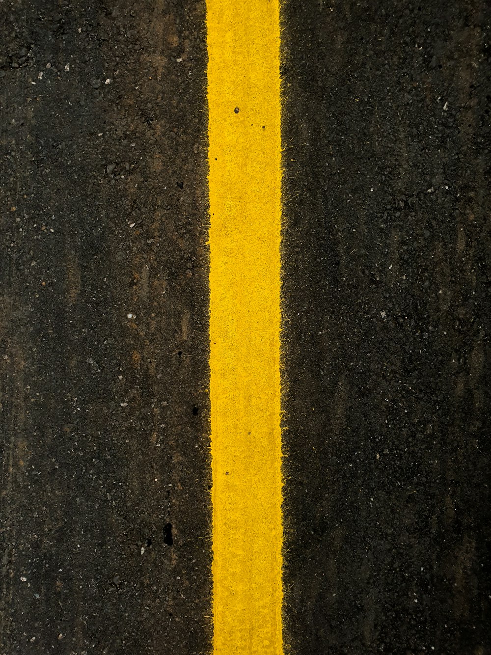 yellow line on black sand