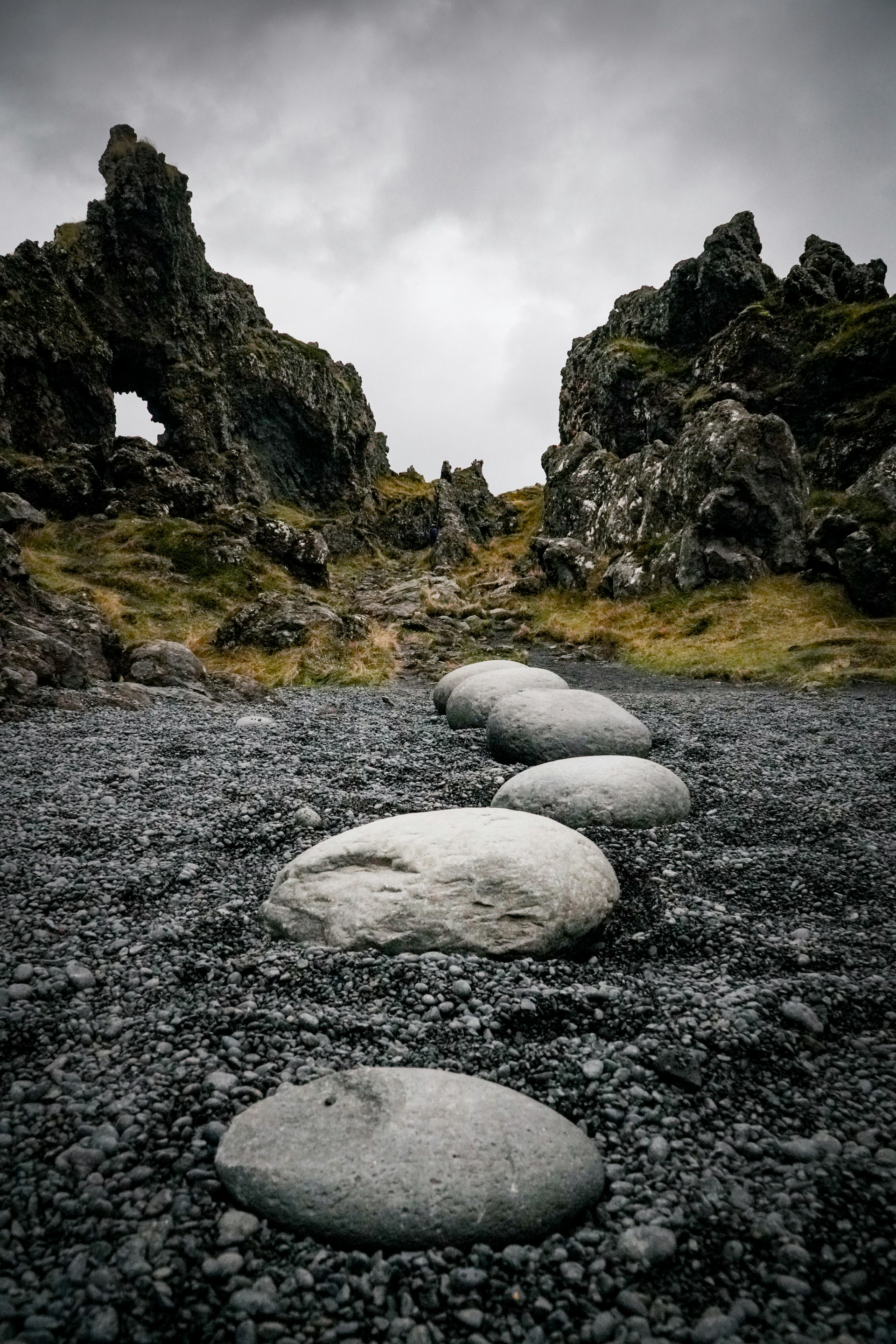 white rocks on gray rocky ground