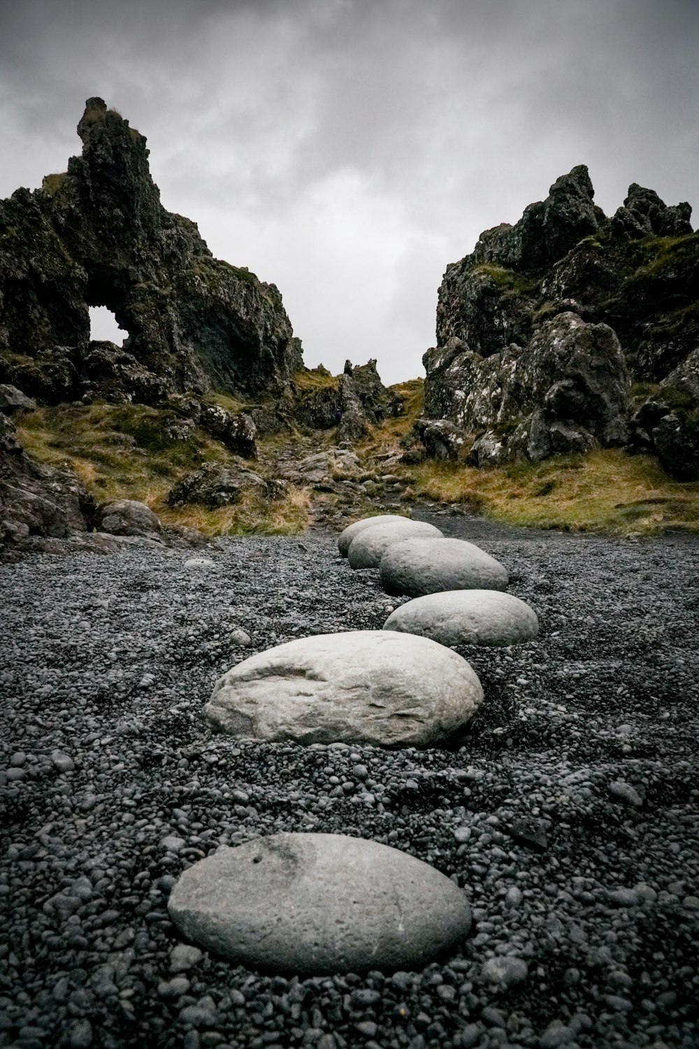 white rocks on gray rocky ground