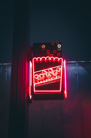 A dynamic movie night scene with popcorn and glowing neon accents.