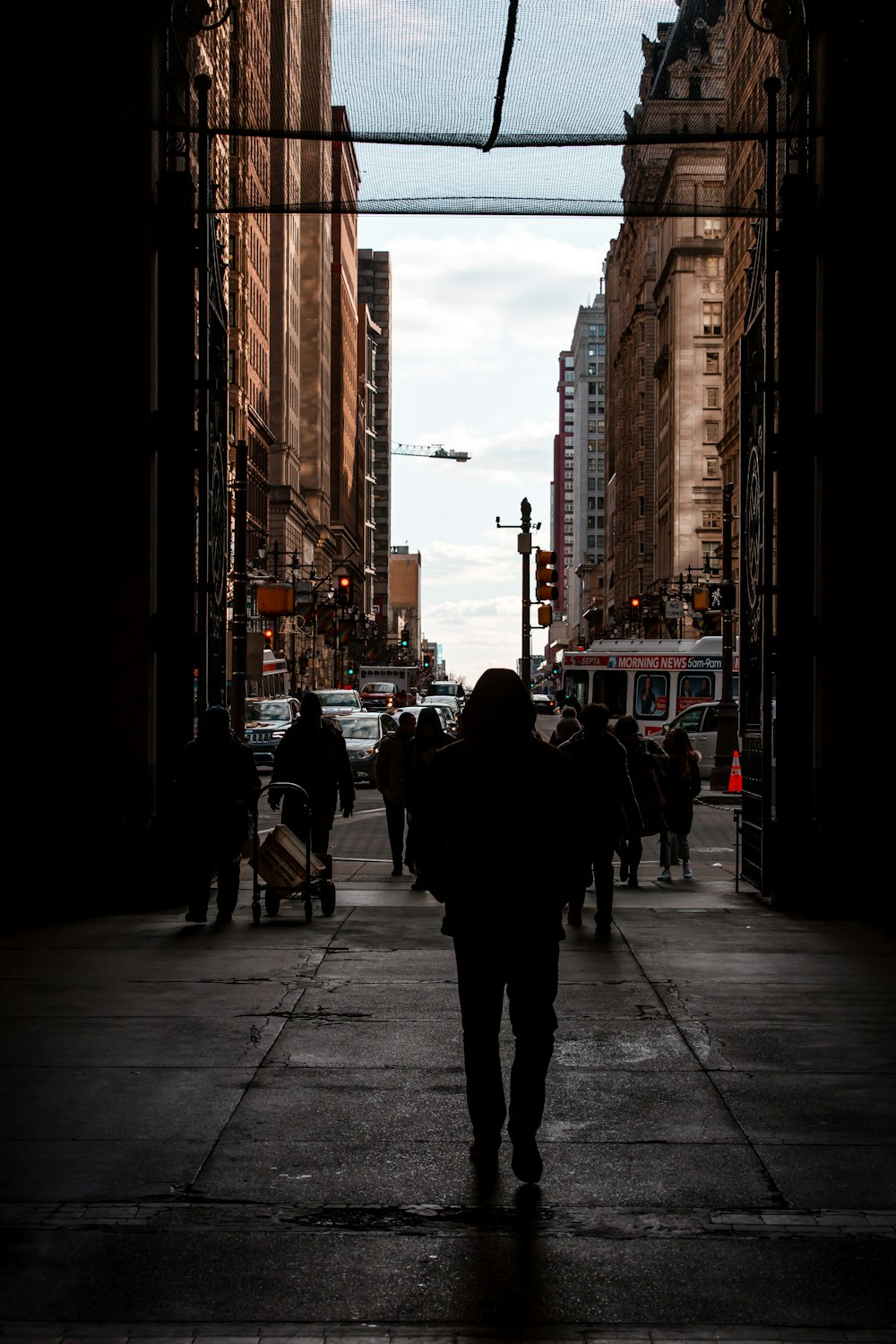 people walking on sidewalk during daytime