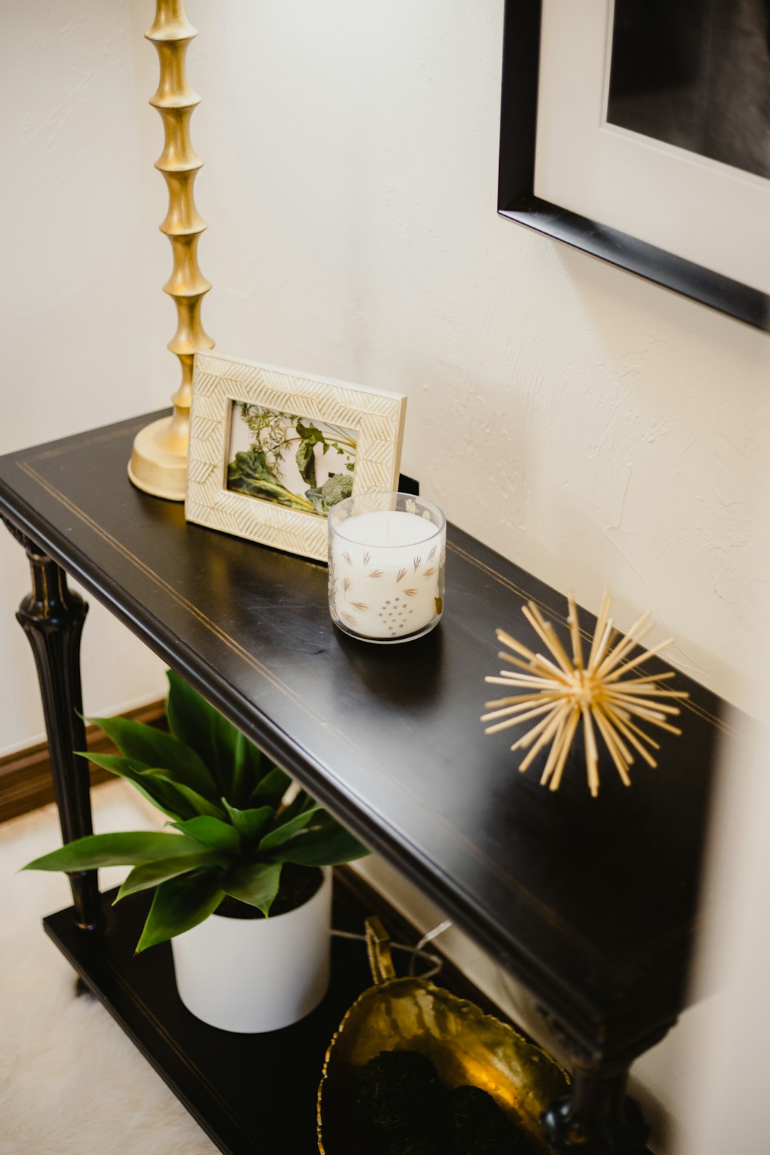 white and black ceramic mug on gray wooden table