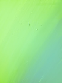 green painted wall with hole