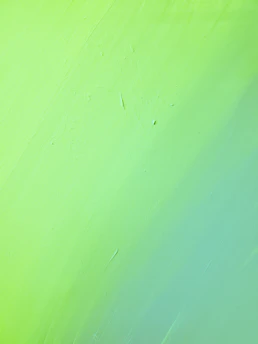 green painted wall with hole